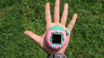 Here's the absolutely massive Tamagotchi Paradise next to other objects in the wild, for scale