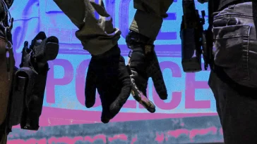 ICE's New Shock Gloves: Painful Truth & How They Work