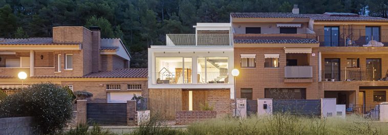 Passive design helps Casa 22 Avellaners blend into Catalonia